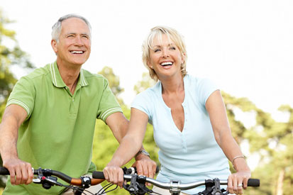Older couple riding bikes 