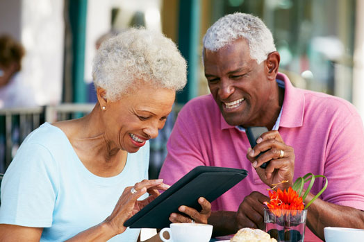 Older couple using ipad 