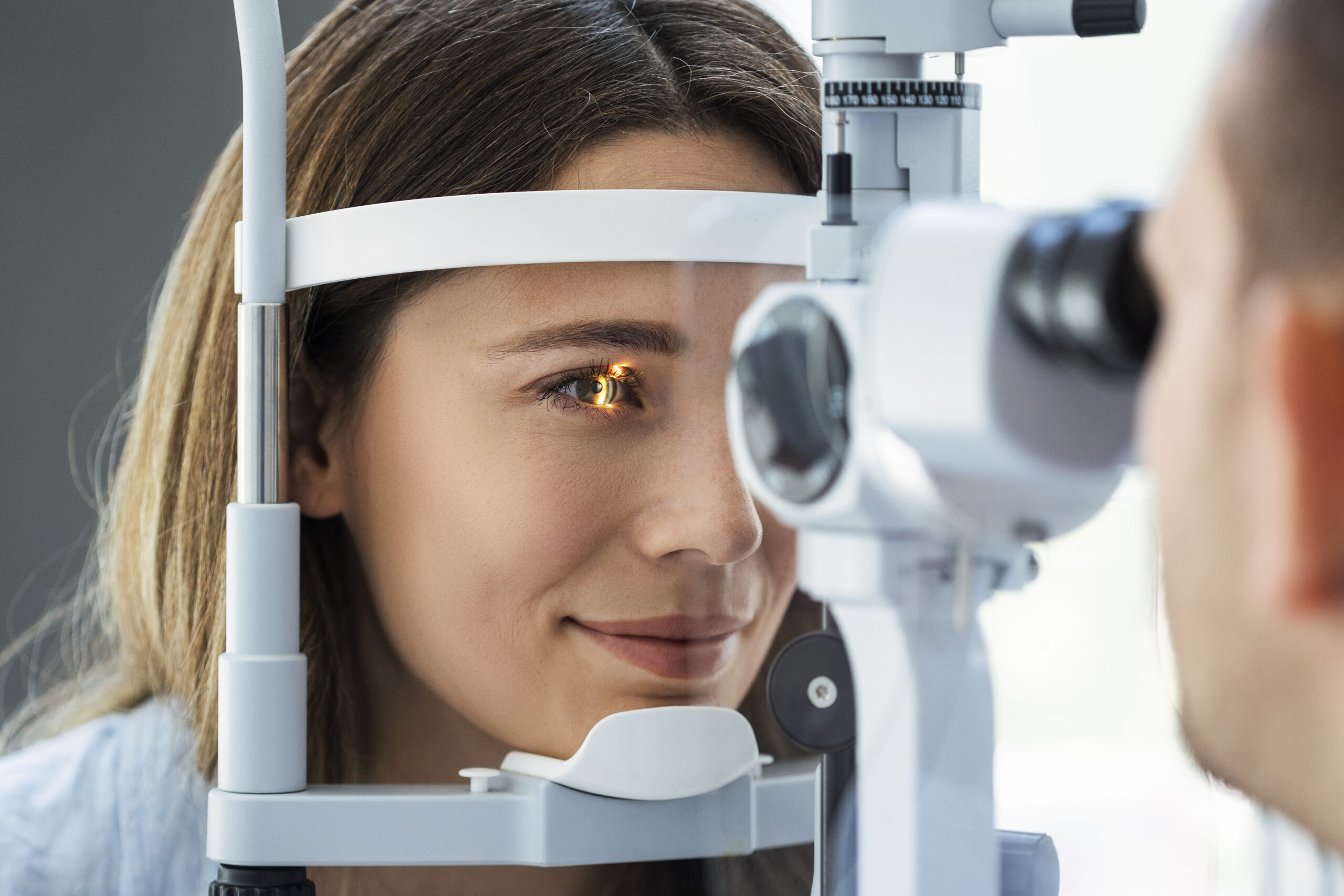 Woman having an eye exam for dry eye treatment